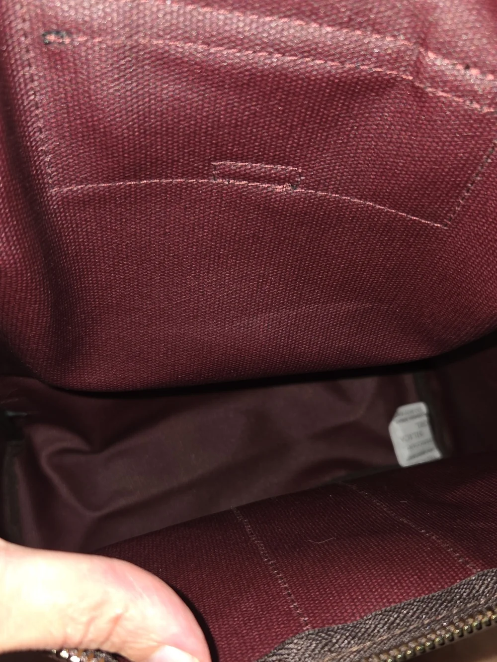 henri bendel Burgundy Canvas Backpack with Black Trim and Striped Strap
